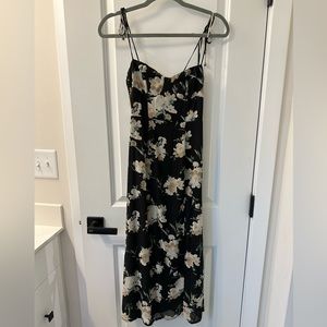 Petal and pup dress. Black with floral pattern. Size 2